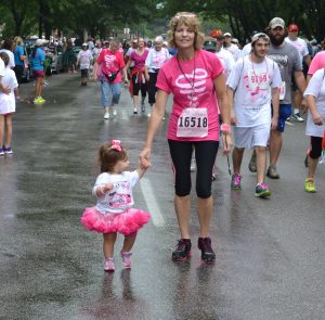 Kim and her granddaughter crossing the finish line of the Susan G. Komen Race for the Cure