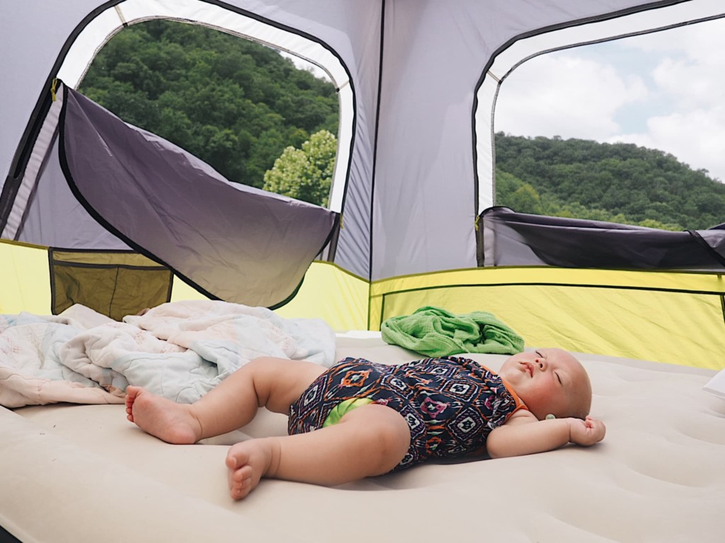 baby in camping tent