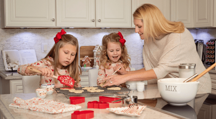 girls and mom making cookies
