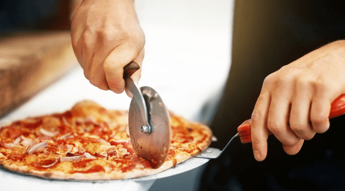 cutting pizza