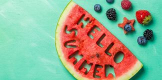 pic of watermelon with "Hello Summer" cut into it