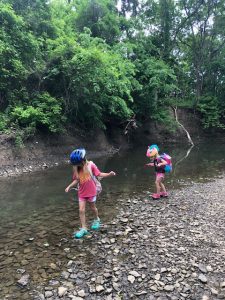 kids exploring creek