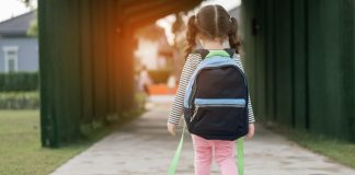 pic of little girl walking to school