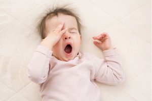 toddler girl yawning