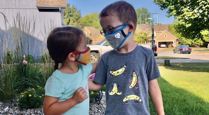 pic of two kids wearing masks