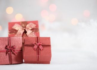 wrapped gifts on a snowy background