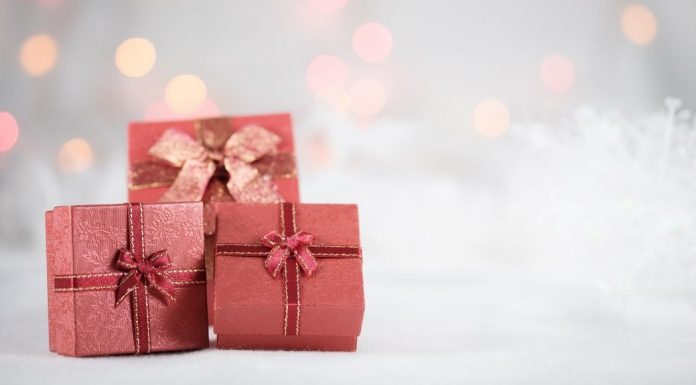 wrapped gifts on a snowy background