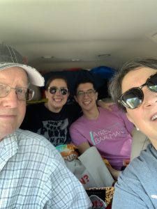 family with adult children on road trip