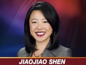 Image of Chinese news anchor with her name JiaoJiao Shen on a banner across the bottom
