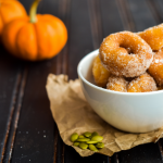 donuts in a bowl with pumpkins