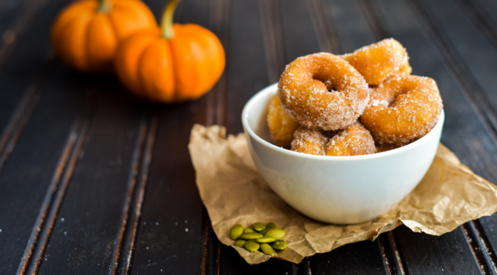 donuts in a bowl with pumpkins