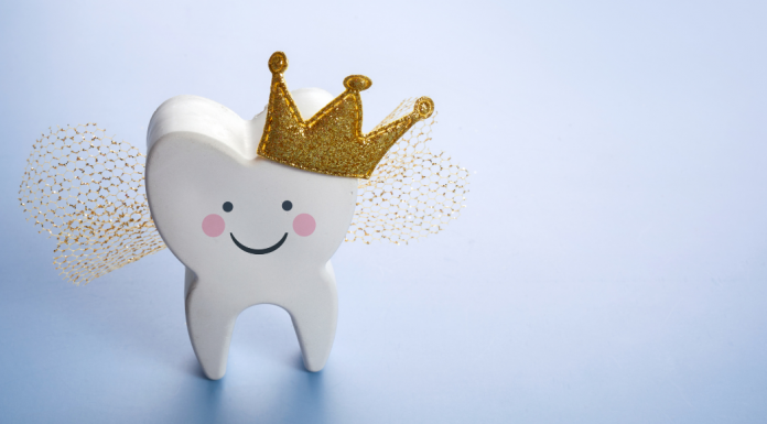 smiling tooth with gold crown