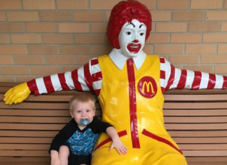 boy with Ronald McDonald statue