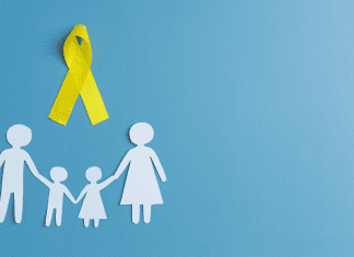 Paper doll family with yellow suicide prevention ribbon