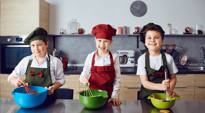boys dressed up as chefs cooking